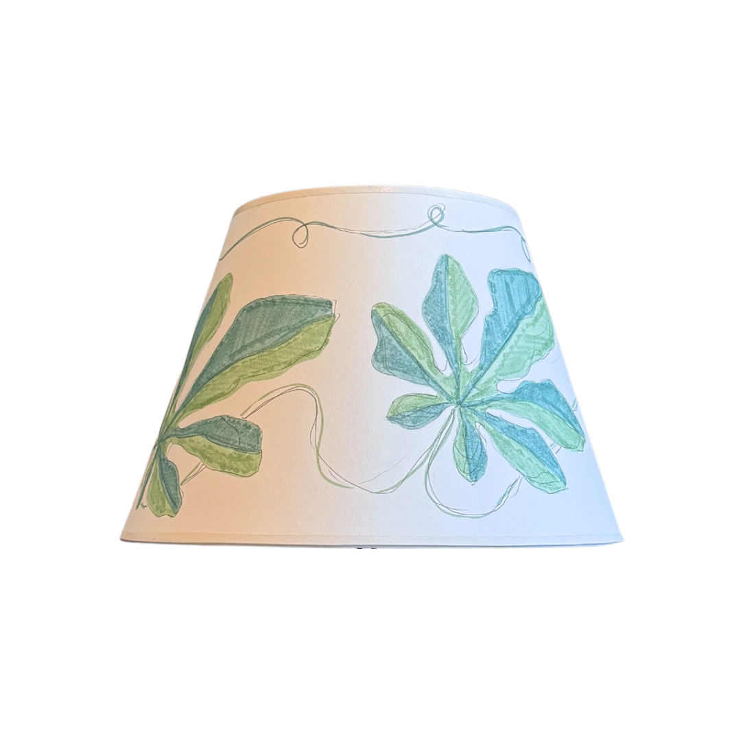 Lampshade with leaf pattern on a white background