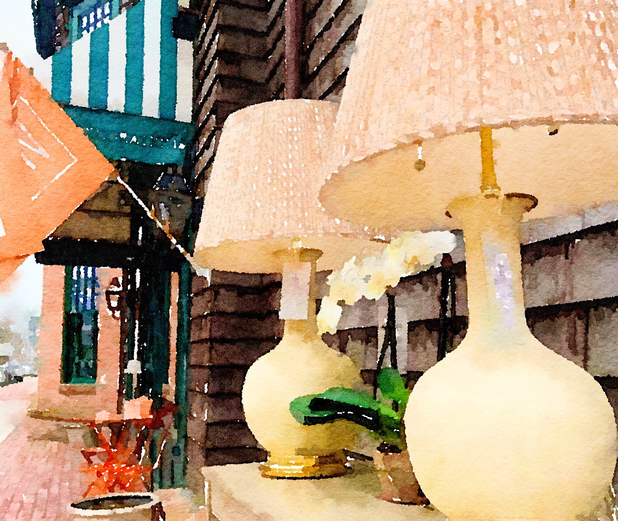 Two decorative lamps on a table with a blurred background