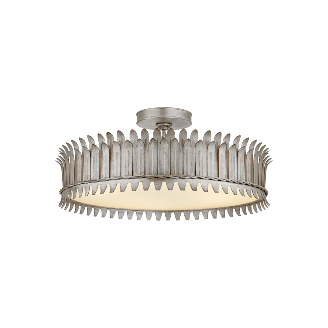 Ceiling light fixture with decorative metal design on a white background