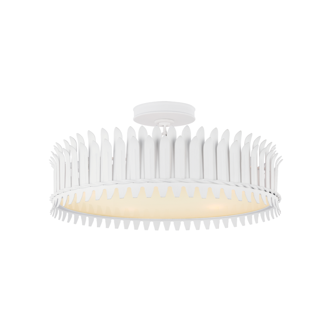White ceiling light fixture with decorative design on a white background
