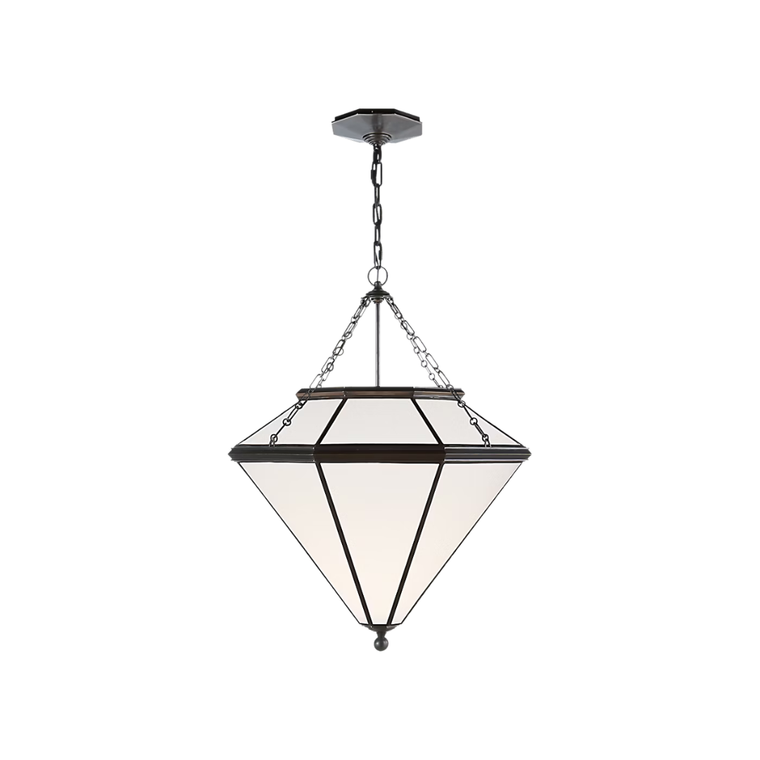 A geometric pendant light fixture with a diamond-shaped frosted glass shade and a dark bronze metal frame, suspended by chains from a matching ceiling canopy against a plain white background.