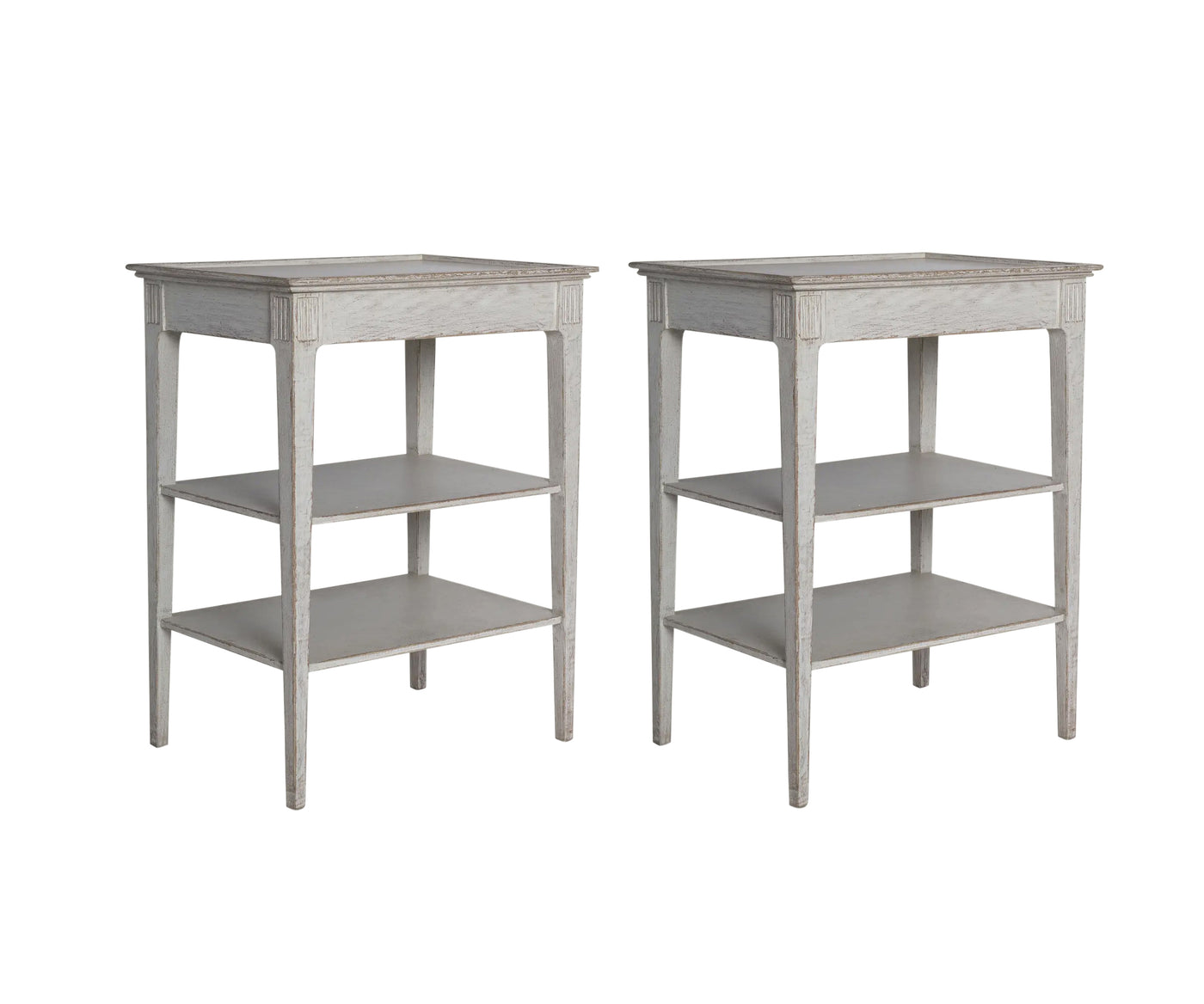 A Pair of Three Tier Side Tables in an Antique White Finish  | Newport Lamp And Shade | Located in Newport, RI